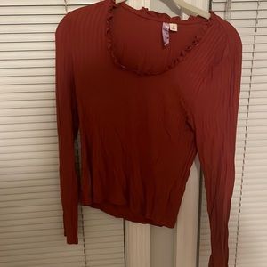 Red ruffle necked long sleeve shirt